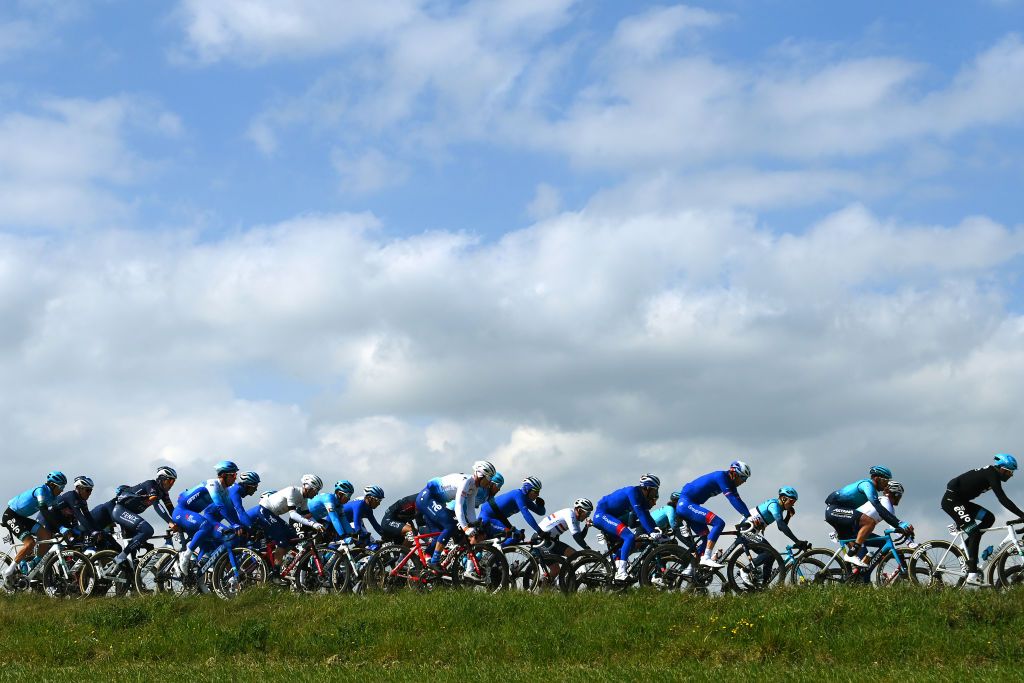 CARPEGNA ITALY MARCH 12 A general view of the Peloton passing through a cloudy landscape during the 57th TirrenoAdriatico 2022 Stage 6 a 215km stage from Apecchio to Carpegna 746m TirrenoAdriatico WorldTour on March 12 2022 in Carpegna Italy Photo by Tim de WaeleGetty Images