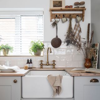 kitchen with white window and white sink