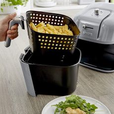 Swan Retro Air Fryer being used to cook chips
