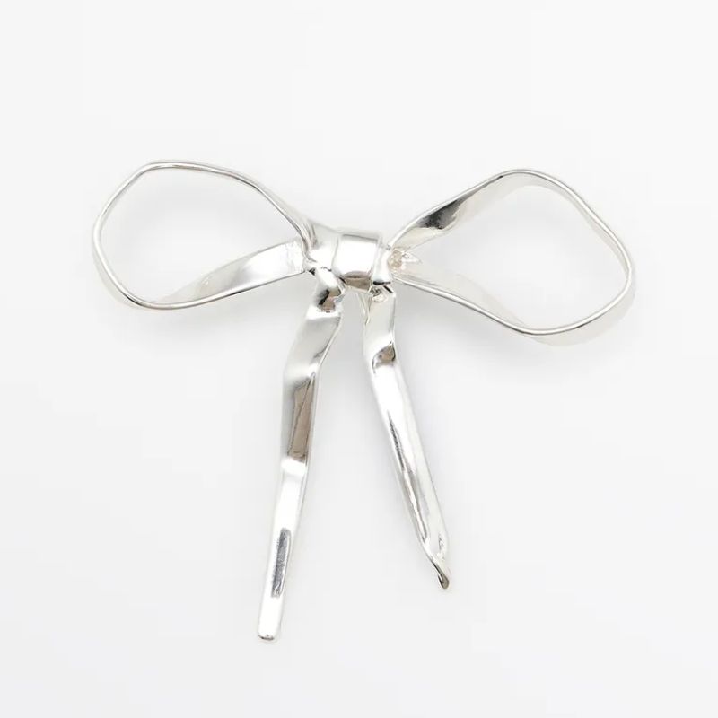 silver metal bow