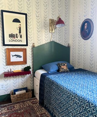 wallpapered kids bedroom with vintage wall art and accessories