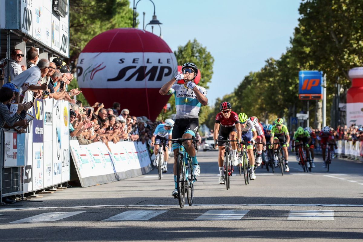 Lutsenko's late attack out of the peloton saw him catch and pass the break