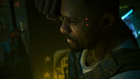 Reed with his hand against his head in Cyberpunk 2077 Phantom Liberty.