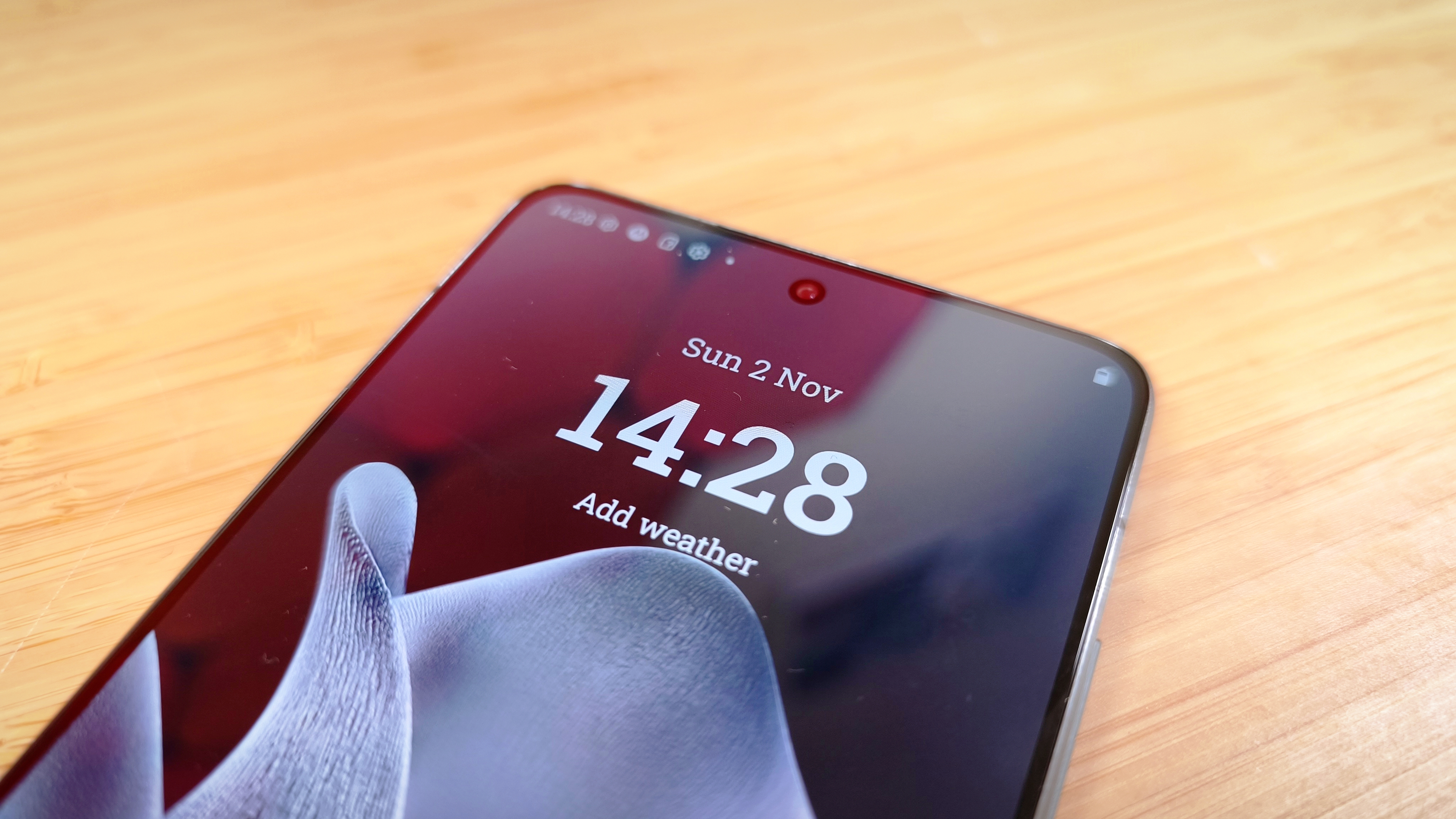 Motorola Edge 70 phone on a wooden desk