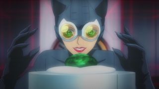 Catwoman peering at jewel locked in glass case