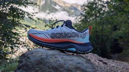 Saucony Peregrine 16 trail shoe on a rock