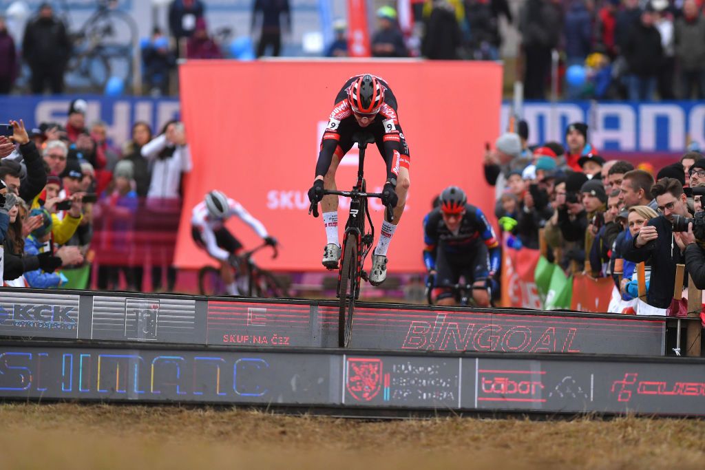 TABOR CZECH REPUBLIC NOVEMBER 14 Michael Vanthourenhout of Belgium and Team Pauwels Sauzen Bingoal jumps during the 25th Tabor UCI CycloCross Worldcup 2021 Mens Elite CXWorldCup on November 14 2021 in Tabor Czech Republic Photo by Luc ClaessenGetty Images