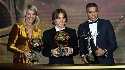 Women’s Ballon d’Or winner Ada Hegerberg, men’s winner Luka Modric and Kopa Trophy winner Kylian Mbappe 