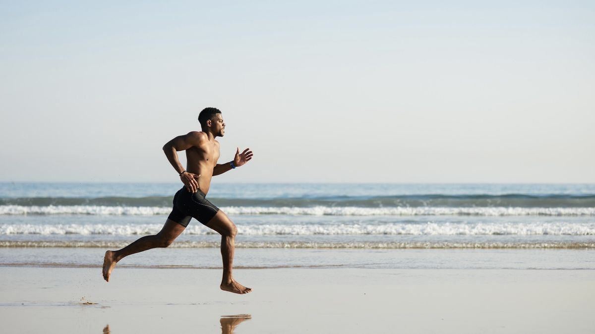 man running on beach