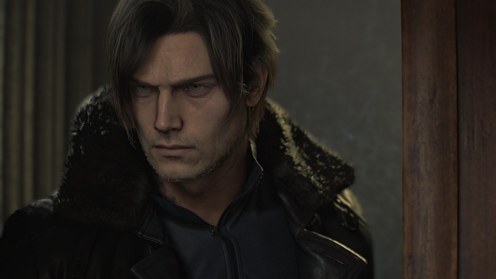 A close-up of Leon, frowning in a big black coat, in Resident Evil Requiem