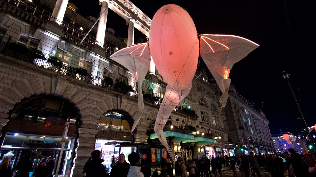 Les Lumineoles by artist Porte par le vent floats eerily above Piccadilly