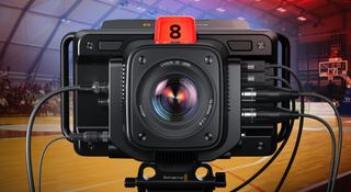 Blackmagic Studio camera 6K Pro looking faceon with a lens and red light
