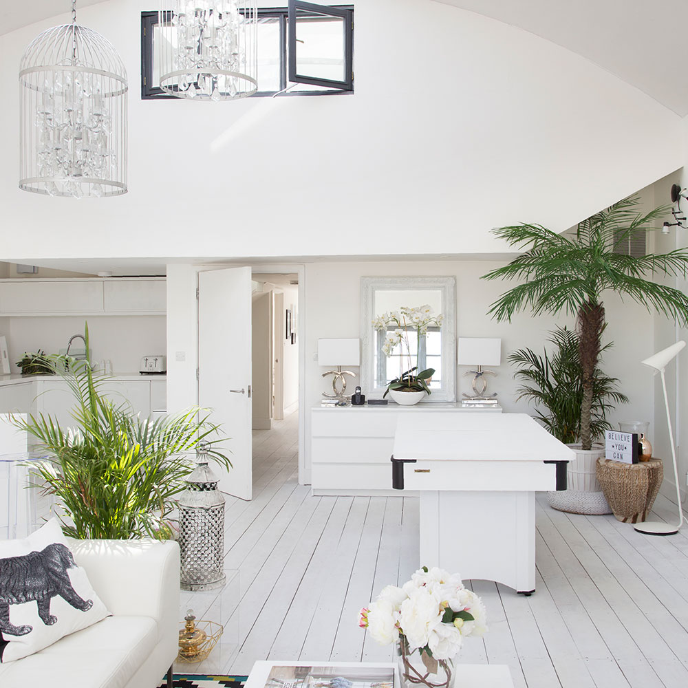 hall with birdcage chandeliers