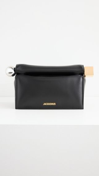 Jacquemus black clutch with silver and gold clasp