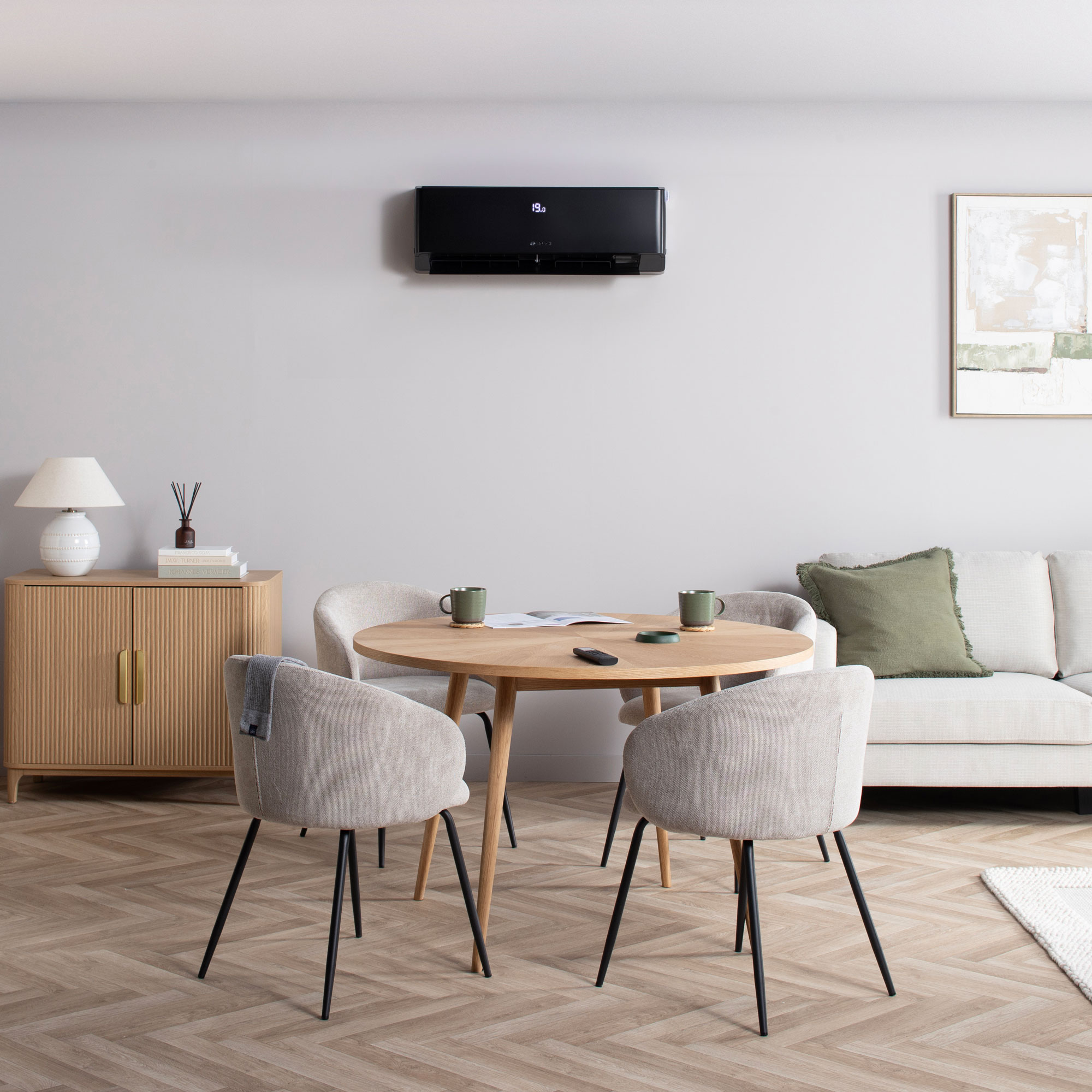 black Worcester Bosch air conditioning unit on wall of dining room