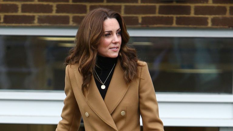 Britain's Catherine, Duchess of Cambridge gestures as she leaves the Ely & Caerau Children's Centre in Cardiff, south Wales on January 22, 2020 as she launches a UK wide survey to help improve early childhood