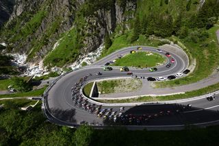 GOTTHARD PASS SWITZERLAND JUNE 12 A general view of the peloton climbing to the Gotthardstrasse 2017m during the 87th Tour de Suisse 2024 Stage 4 a 171km stage from Ruschlikon to Gotthard Pass 2092m on UCIWT June 12 2024 in Gotthard Pass Switzerland Photo by Tim de WaeleGetty Images