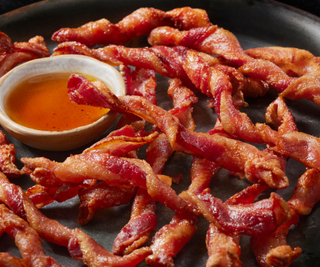 Bacon twists with a maple syrup dipping sauce