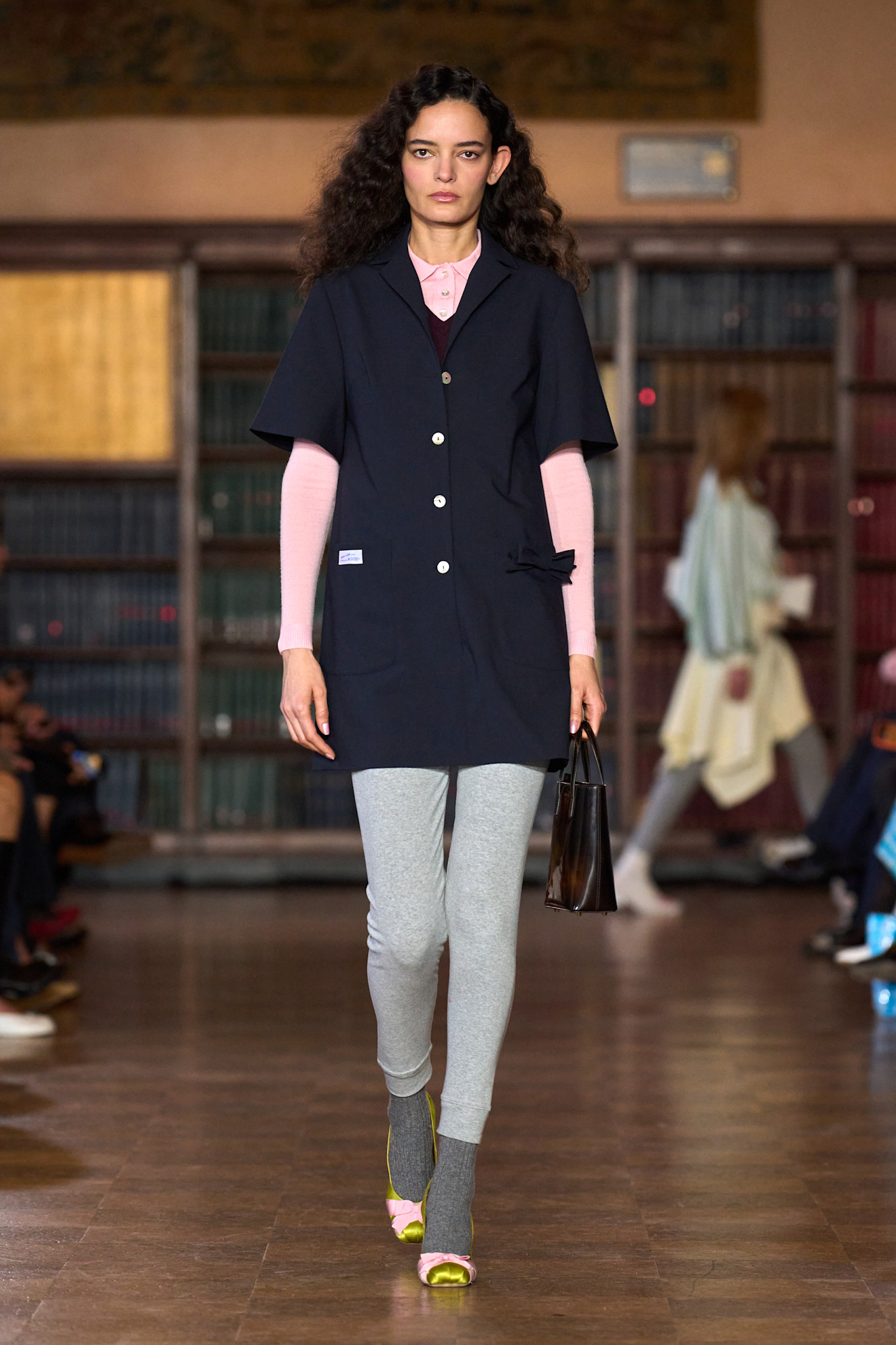 models walk the Sandy Liang Fall 2026 fashion show runway wearing slipper shoes 