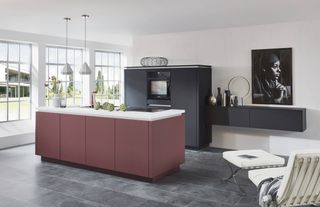 Two tone kitchen in rust red and charcoal