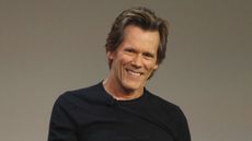 kevin bacon on a gray background