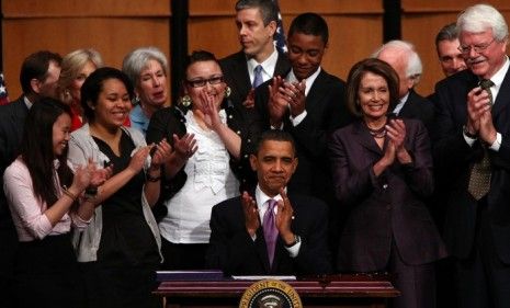 In March, Obama signed the first health care bill that required Americans to purchase insurance.