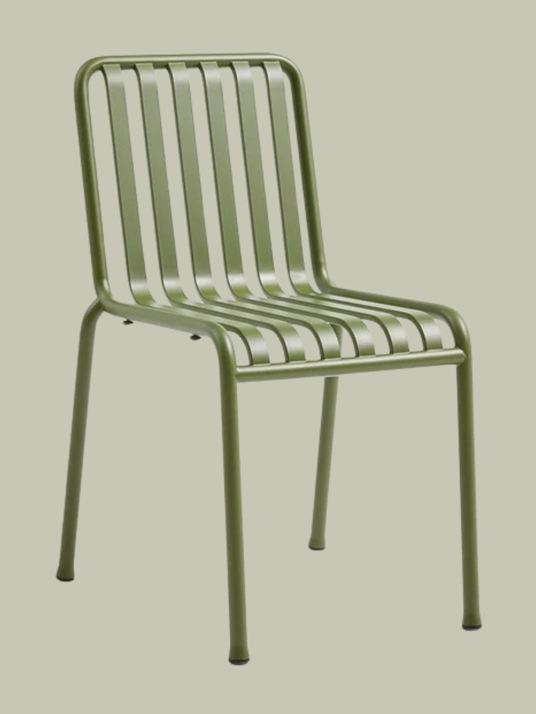 A green metal dining chair from HAY