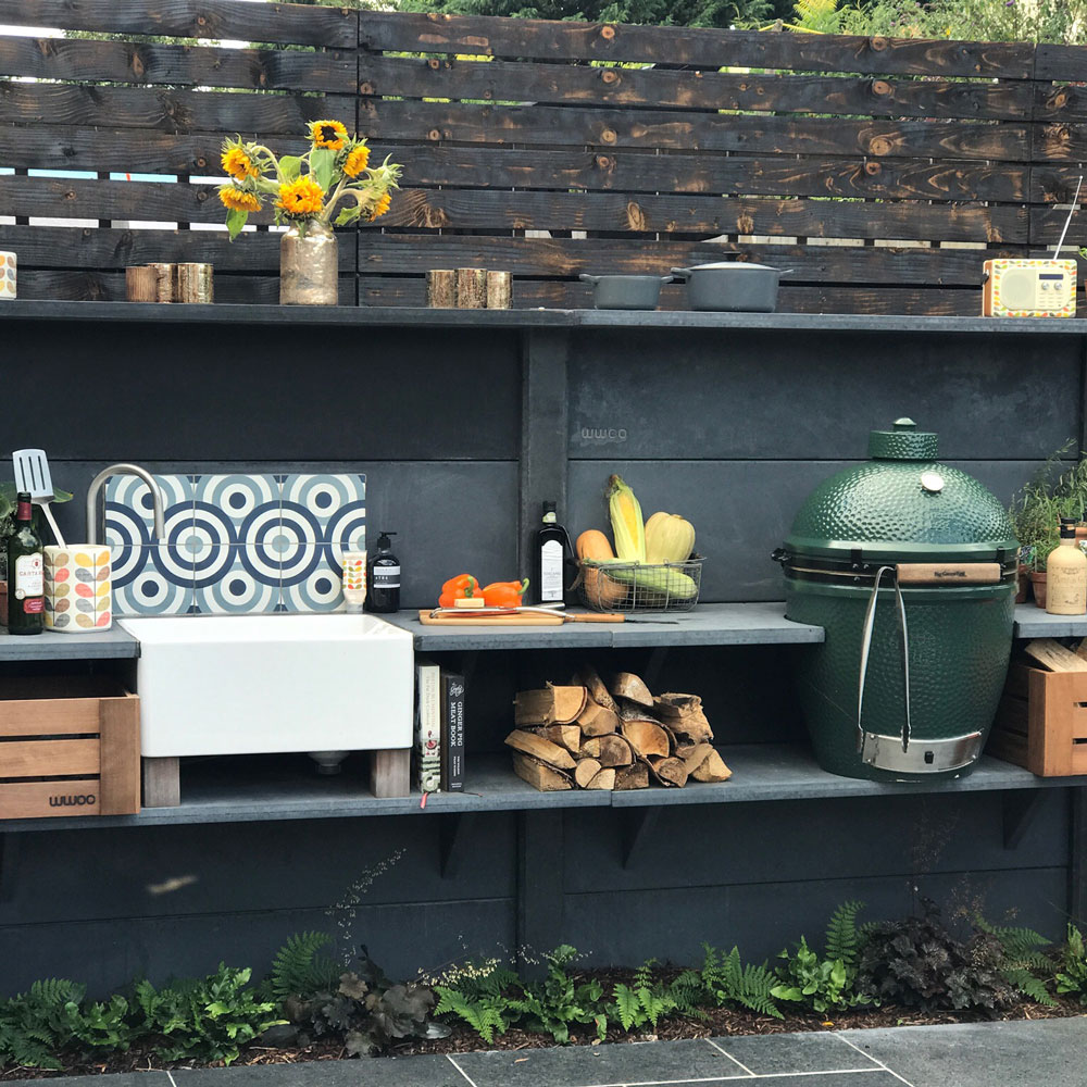outdoor kitchen with sink and shelves