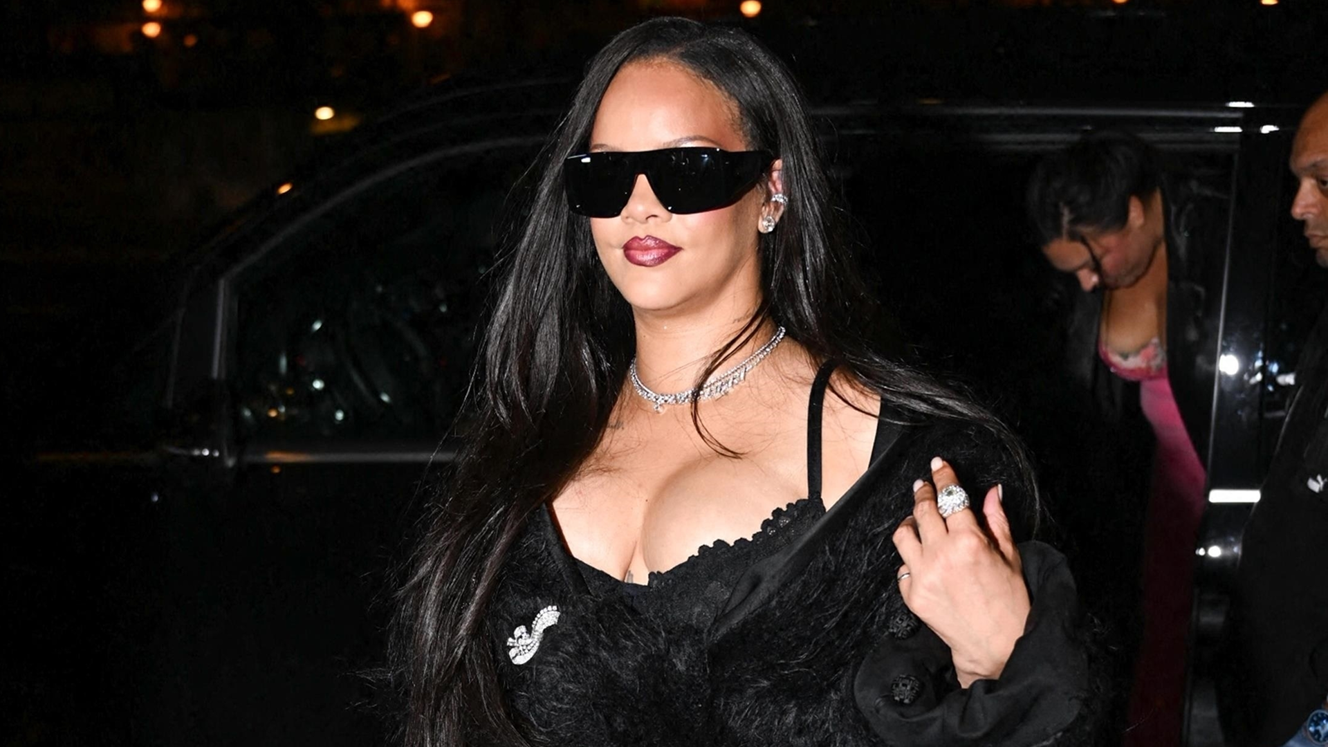 Rihanna trades fresh-off-the-runway Dior couture for a knitted little black dress 