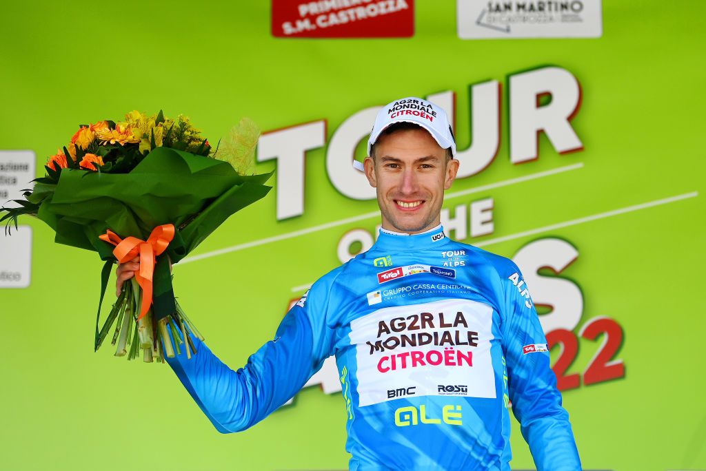 SAN MARTINO DI CASTROZZA ITALY APRIL 18 Geoffrey Bouchard of France and AG2R Citroen Team celebrates winning the blue mountain jersey on the podium ceremony after the 45th Tour of the Alps 2022 Stage 1 a 1609km stage from Cles to PrimieroS Martino di Castrozza 708m TouroftheAlps on April 18 2022 in San Martino di Castrozza Italy Photo by Tim de WaeleGetty Images