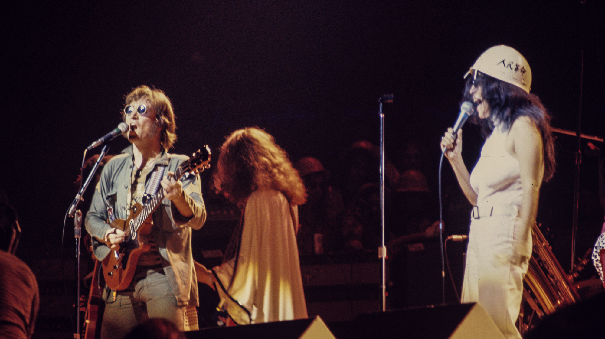 John Lennon and Yoko Ono perform at the "One To One" Concert - 8/30/72,