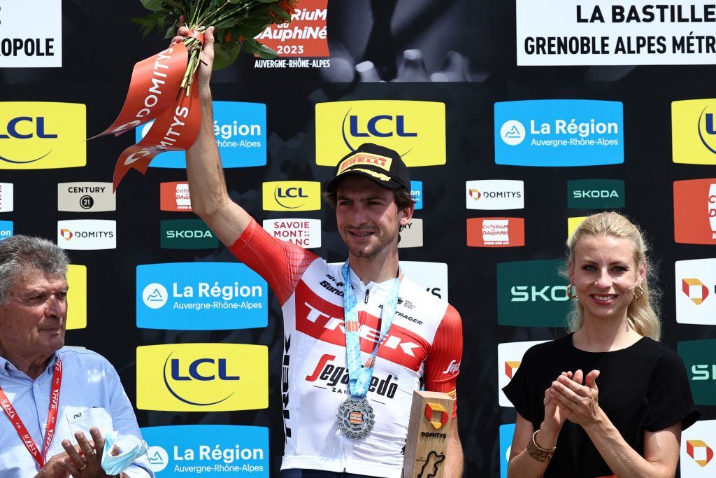 Trek Segafredo&rsquo;s Giulio Ciccone celebrates on the podium after winning the eighth stage of the 75th edition of the Criterium du Dauphine