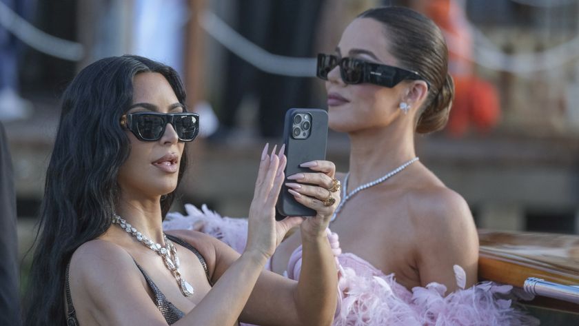 Kim Kardashian and Khloe Kardashian attending the wedding of Jeff Bezos and Lauren Sanchez in Venice