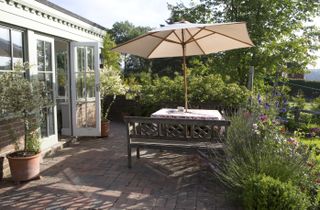 patio and orangery in the summer garden