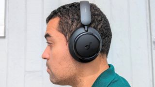 Our reviewer wearing Anker Soundcore Space Q45 ANC headphones