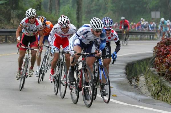 Jai Crawford (Savings and Loans) approaching the peak of the main climb in the lead.
