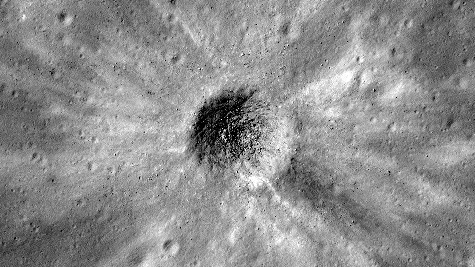 Moon&#039;s surface. A photo of a lunar crater, measuring about 600 feet (185 meters) across, captured by NASA&#039;s Lunar Reconnaissance Orbiter. Credit to Credit NASA and GSFC and Arizona State University