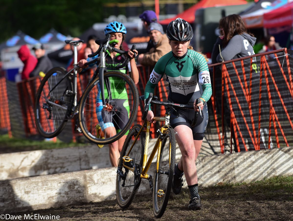 Libby White (House Industries) running the barriers with two laps to go