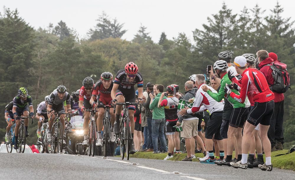 Riders chase Wout Poels near the end of stage 6 in Britain
