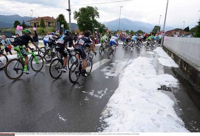 Storms left the road littered with hail on stage 13