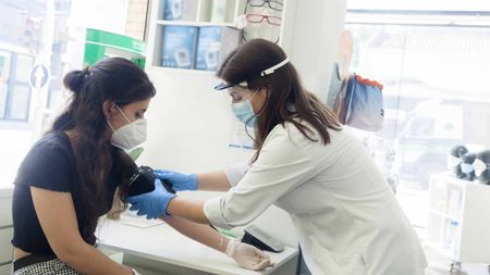 Doctor examining patient.