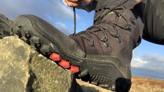 Close up of hiker tying laces