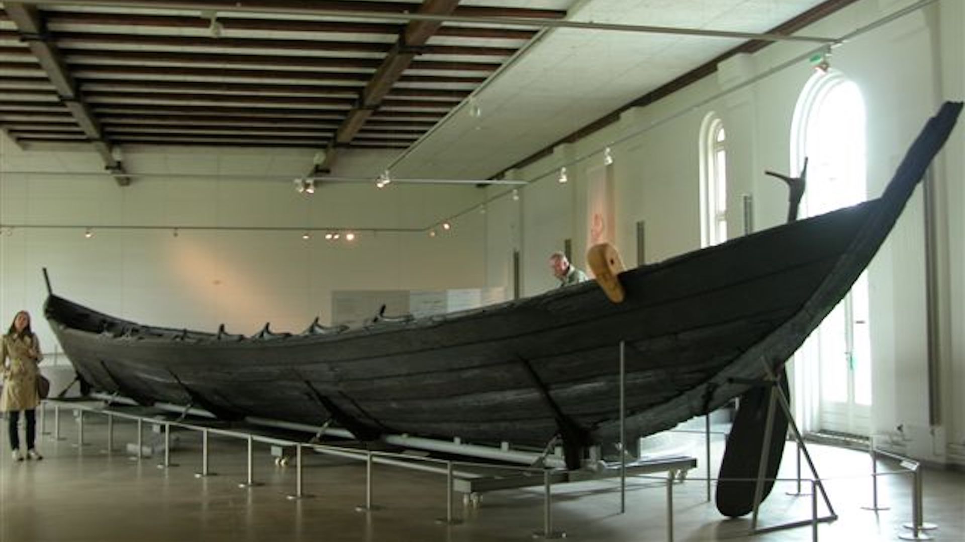 The Nydam boat on display in a museum