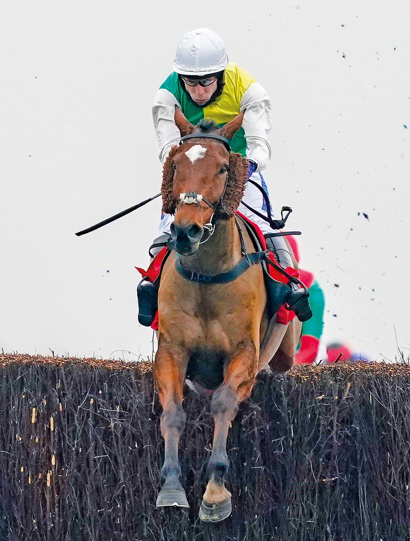 NEWBURY, ENGLAND - NOVEMBER 28: Tom Scudamore riding Cloth Cap clear the last to win The Ladbrokes Trophy Chase at Newbury Racecourse on November 28, 2020 in Newbury, England. Owners are allowed to attend if they have a runner at the meeting otherwise racing remains behind closed doors to the public due to the Coronavirus pandemic. (Photo by Alan Crowhurst/Getty Images)