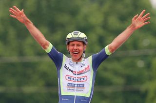 Team Wanty rider Netherlands Taco Van der Hoorn reacts as he crosses the finish line to win the third stage of the Giro dItalia 2021 cycling race 190 km between Biella and Canale Piedmont on May 10 2021 Photo by Luca Bettini AFP Photo by LUCA BETTINIAFP via Getty Images