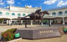 Louisville, Kentucky, USA - August 16, 2015:Churchill Downs in Louisville, Kentucky with a statue of the Kentucky Derby winning horse, Barbaro.