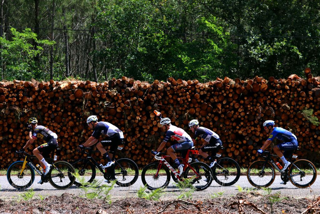 LIBOURNE FRANCE JULY 16 Mike Teunissen of The Netherlands and Team JumboVisma Max Walscheid of Germany and Team Qhubeka NextHash Edward Theuns of Belgium and Team Trek Segafredo Simon Clarke of Australia and Team Qhubeka NextHash Davide Ballerini of Italy and Team Deceuninck QuickStep in breakaway during the 108th Tour de France 2021 Stage 19 a 207km stage from Mourenx to Libourne LeTour Luxey Village TDF2021 on July 16 2021 in Libourne France Photo by Michael SteeleGetty Images