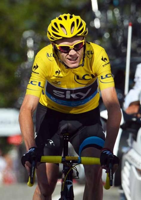 Chris Froome (Team Sky) heads to the finish and savours the moment