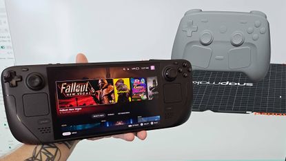 Hand holding Steam Deck OLED next to screen with gray Steam Controller 3D model open in Snapmaker Orca on right.