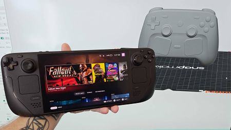 Hand holding Steam Deck OLED next to screen with gray Steam Controller 3D model open in Snapmaker Orca on right.